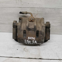 Суппорт передний правый Kia Carnival I рестайлинг