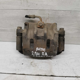 Суппорт передний правый Kia Carnival I рестайлинг Суппорт передний правый Kia Carnival I рестайлинг