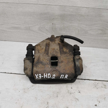 Суппорт передний правый Hyundai Elantra HD, Kia Ceed I