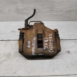 Суппорт передний левый Volkswagen Passat B5 Суппорт передний левый Volkswagen Passat B5