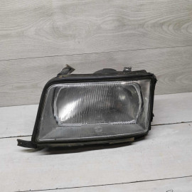 Фара передняя левая Audi 100 c4
