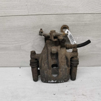 Суппорт задний правый Ford Focus I