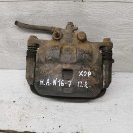 Суппорт передний правый Nissan almera n16