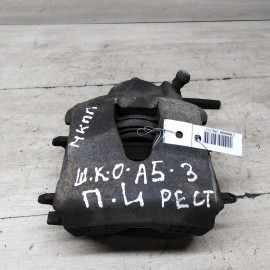 Суппорт тормозной передний левый Skoda Octavia A5 рест