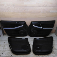 Обшивка двери комплект Mazda CX-7 I  (ПАЧ) 