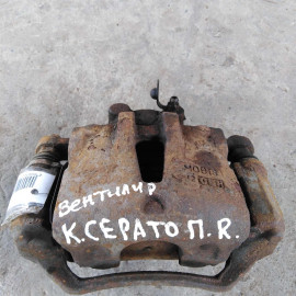 Суппорт тормозной передний правый Kia Cerato 2